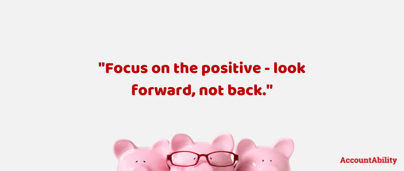 Grey background with 3 pink pigs and a quote in red that says "Focus on the positive - look forward, not back."